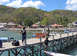 Lene on the pier at Lebuan Bajo