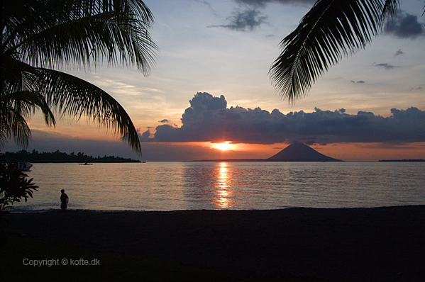 The sun sets on Manado Tua